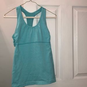 Blue Lululemon workout tank top with built-in bra